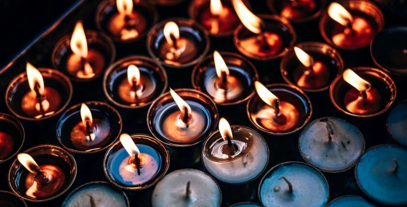 Burning Prayer Candles